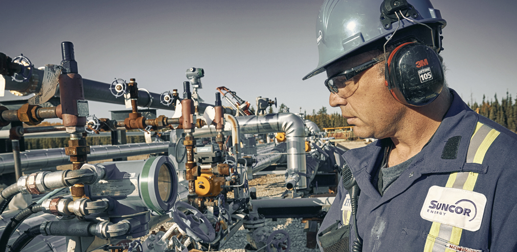 A Suncor operator checks a valve on the ESEIEH pilot at its Dover site, north of Fort McMurray.